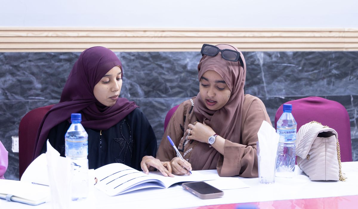 Participants working in the participant workbook